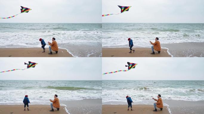 认真的父子在海边放风筝
