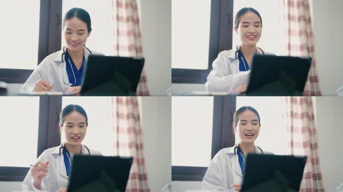 女医生在远程医疗视频通话中与患者交谈