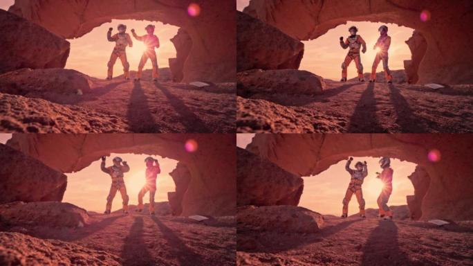 火星红色星球上的两名宇航员。跳舞和庆祝科学发现