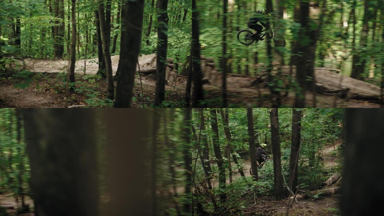 一个戴着头盔的男子在山地自行车道上高速跳过森林跳板的电影镜头。一个在森林里带着mtb在空中跳跃的人。