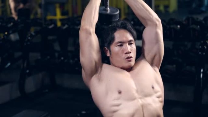 Asia men exercise fitness body building in the gym