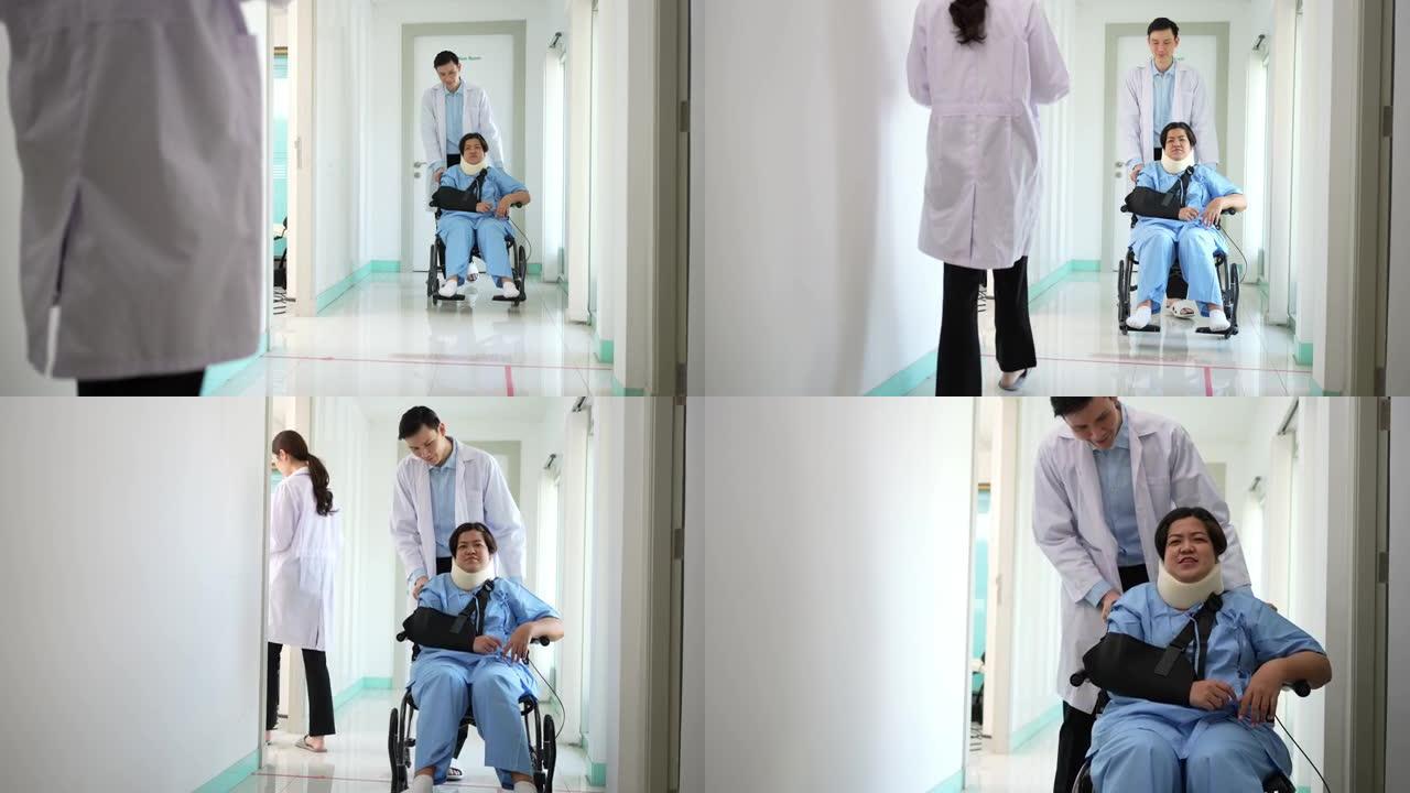 事故发生后，坐在轮椅上的亚洲女性患者与医生交谈，外科医生将患者推上轮椅，事故造成的痛苦