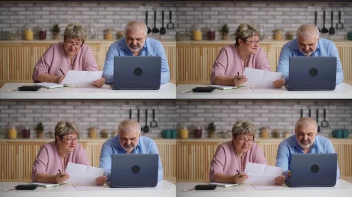 老人和女人在家里用笔记本电脑填写报告，女会计师正在计数并向同事提供数据