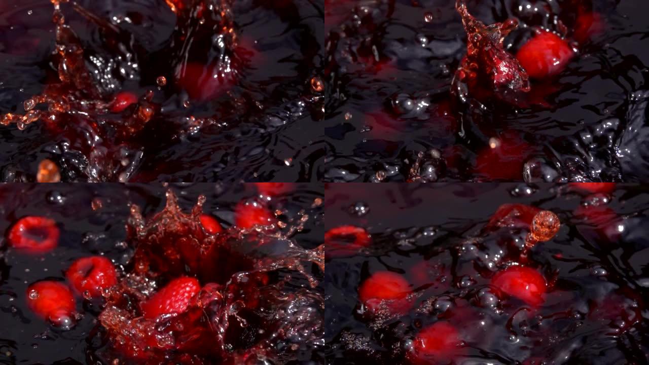 成熟的红树莓随着飞溅落入新鲜果汁中