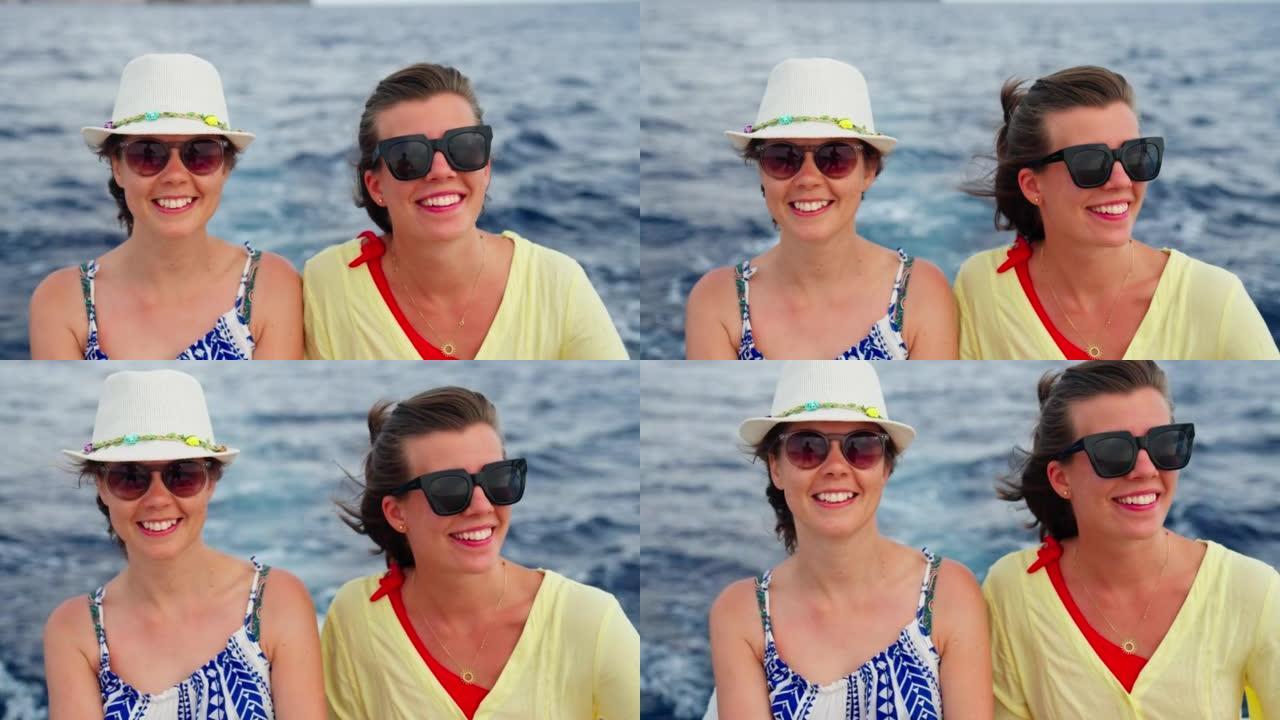 享受梦想假期快艇旅行的女性朋友。微笑自然