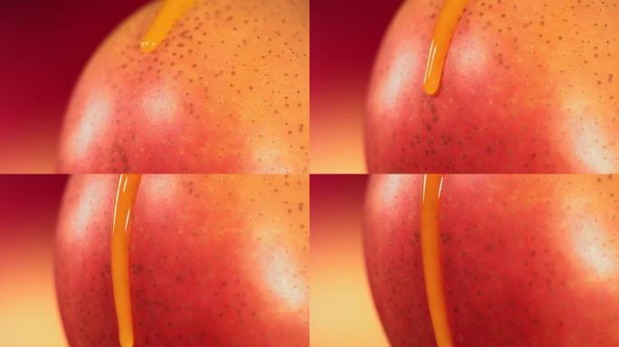 一滴芒果汁从成熟多汁的芒果王表面流下。慢动作