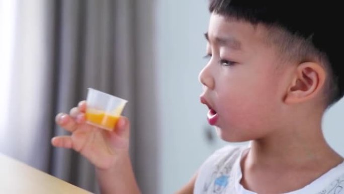 Asian children drink vitamin C to nourish the body