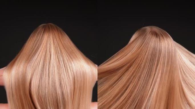 深色背景上美丽诱人的金发女人。扔头发，挥舞着明亮的金色健康头发。超级慢动作