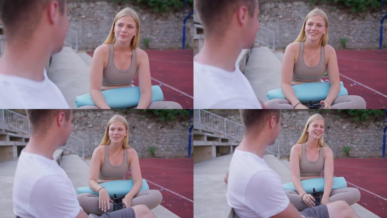 Young Caucasian couple resting after outdoor exerc