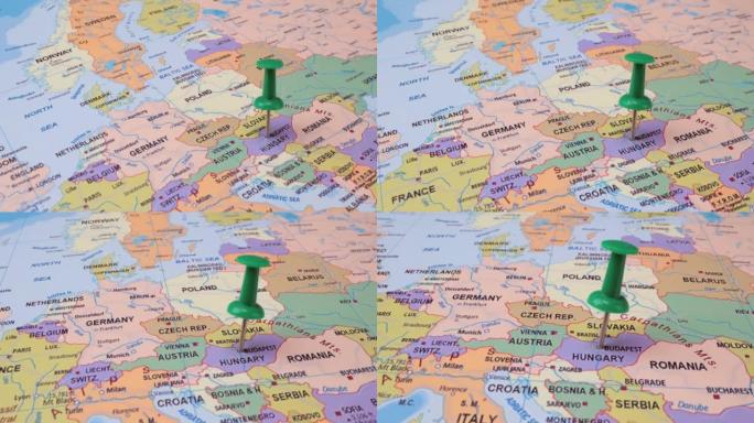 匈牙利-世界地图上带有绿色图钉的旅行概念。地图上的定位点指向匈牙利首都布达佩斯。
