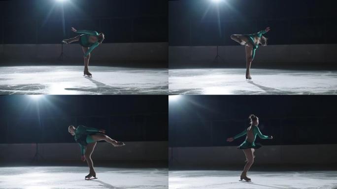 优雅的年轻女子表演花样滑冰的基本元素，站在溜冰鞋上旋转
