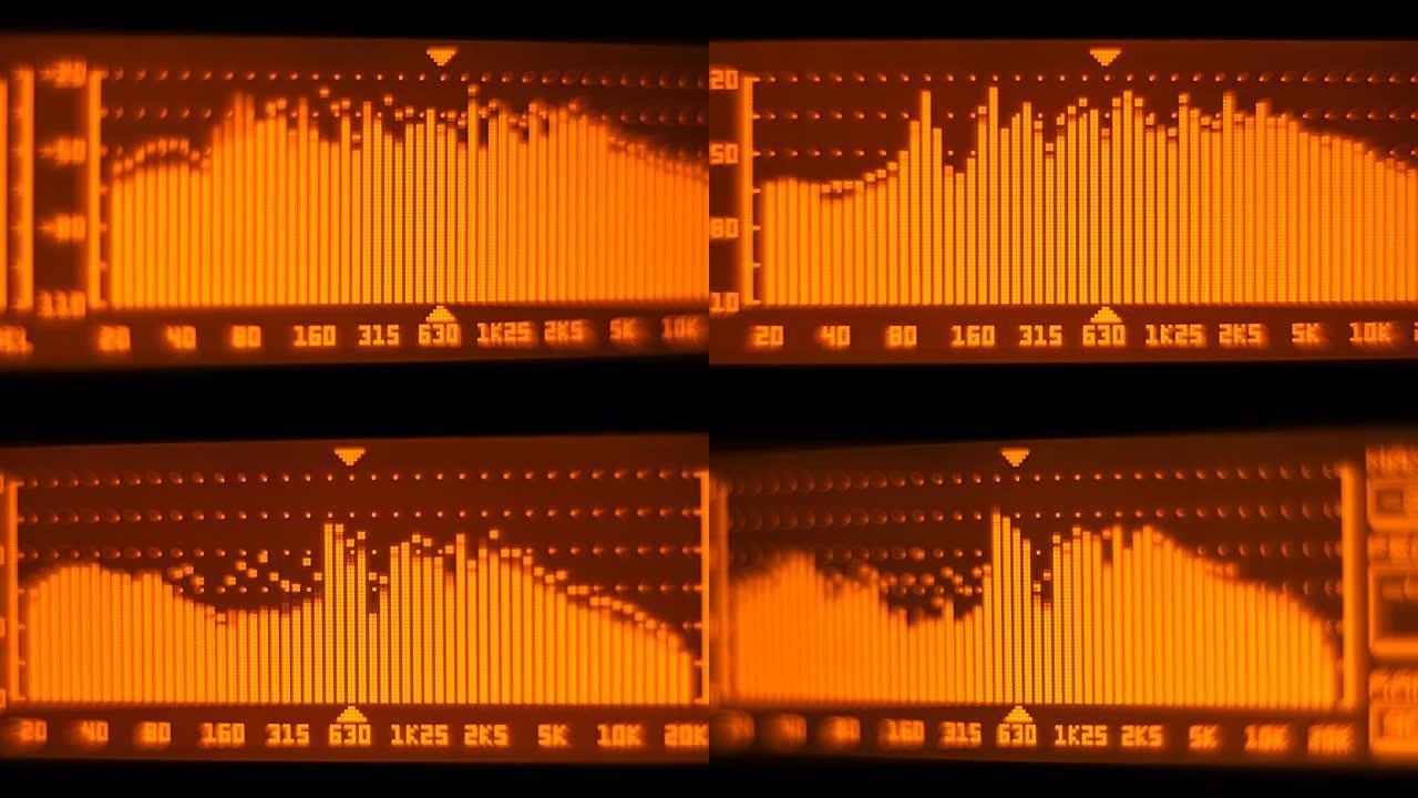 专业音乐会均衡器显示屏上有黄色频谱分析仪