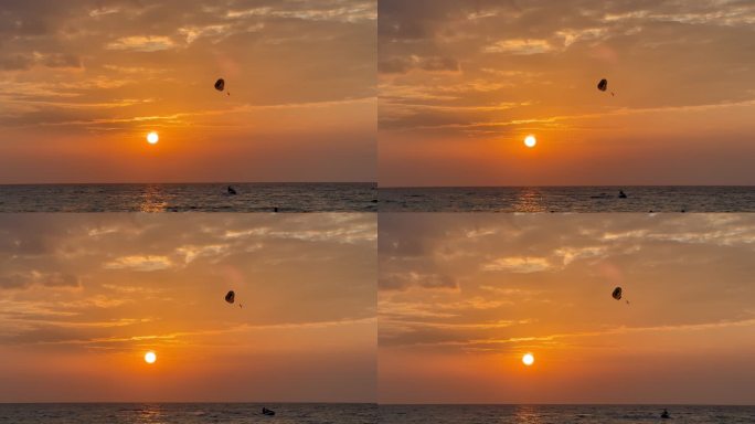 夕阳下的滑翔伞