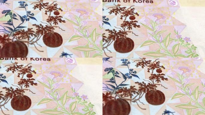韩国，韩国5000纸币，5000韩元，韩国近景和宏观视图，跟踪和拍摄5000韩元纸币观察和储备面，韩