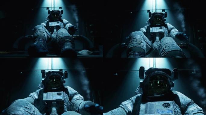 一名受伤但幸存的宇航员躺在宇宙飞船的机舱里。从失事船上幸存的宇航员的概念。动画非常适合空间，科幻背景