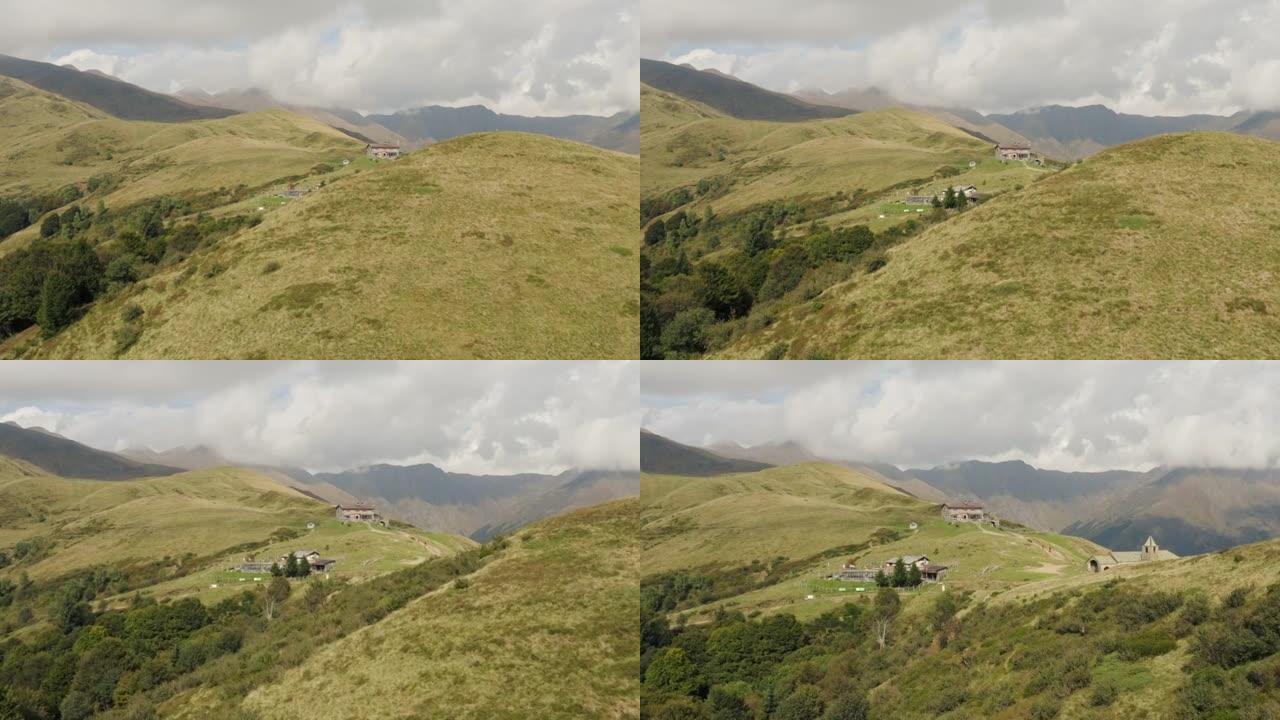空中无人机拍摄了山区草木山坡上的山区农场