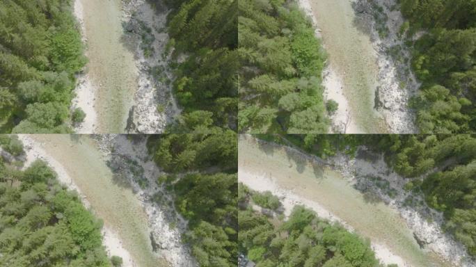 空中无人机可以看到清澈的高山河水，人们可以在岸上跳进去，游泳和放松