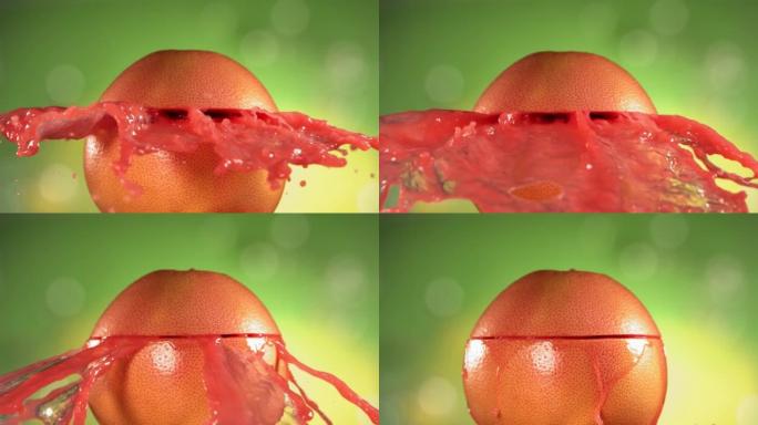 新鲜葡萄柚水果在绿色自然背景4K慢动作中喷出并爆裂果汁