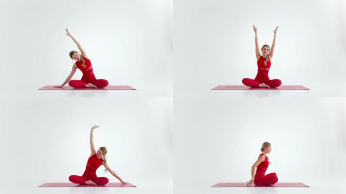 年轻女子展示瑜伽或普拉提练习。年轻迷人的女人在工作室练习瑜伽。女孩在白色背景下展示瑜伽的不同姿势。健