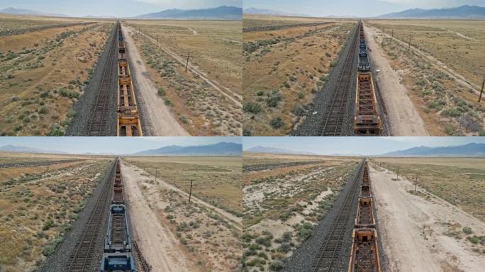 在犹他州沙漠中空车飞越火车轨道
