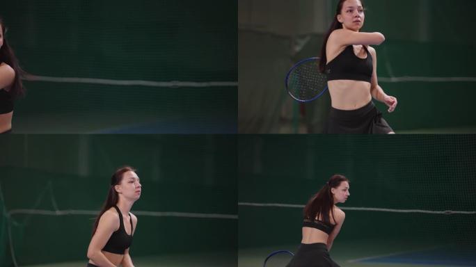 年轻漂亮的女网球运动员在球场上的肖像，球拍击球，比赛内慢动作