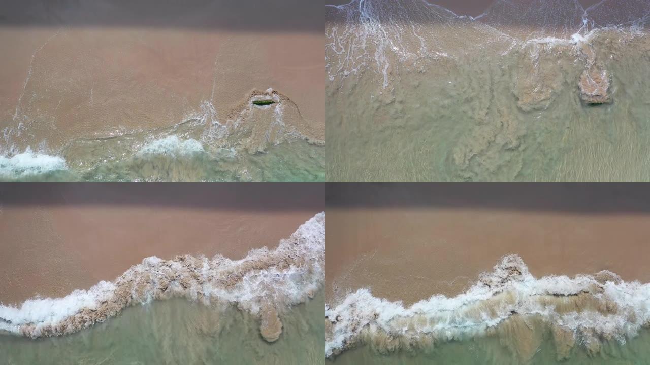 无人机拍摄海浪。海滩正上方