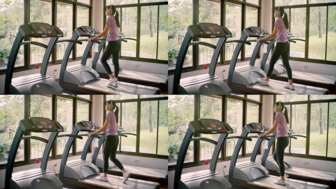 年轻女子在健身中心锻炼。