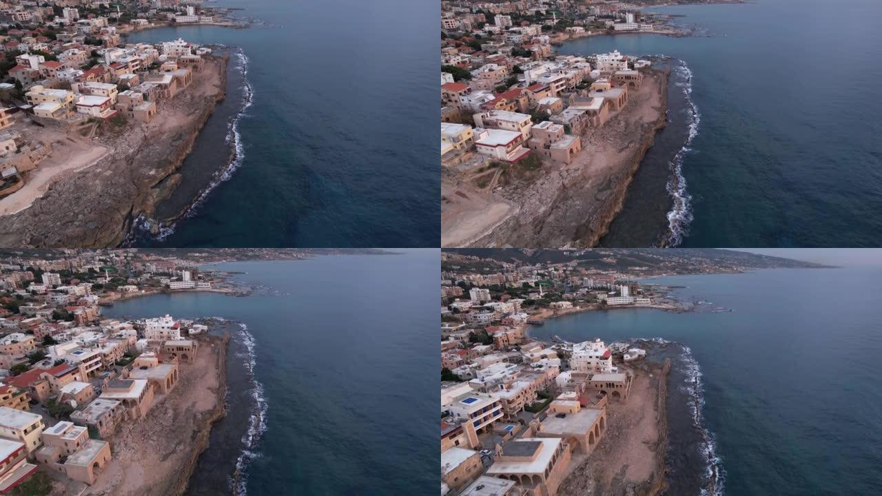 日落时分，空中无人机拍摄了黎巴嫩沿海小镇
