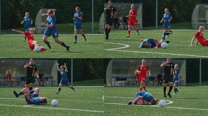 SLO MO TS女足球运动员在足球比赛中被绊倒后摔倒