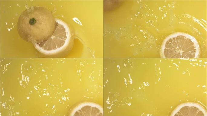 柠檬落在果汁上，分成两半。