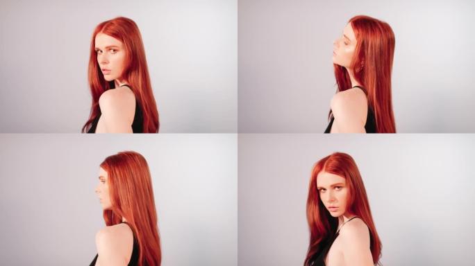 美丽诱人的红发女人看着相机。红色，健康的头发闪耀在明亮的背景