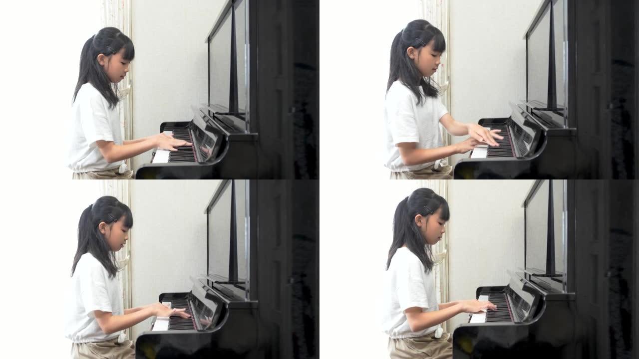 日本女孩弹奏立式钢琴