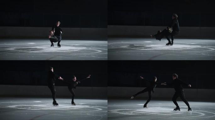 一对花样滑冰运动员正在旋转举重，在黑暗中的空溜冰场训练