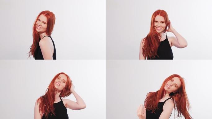 美丽诱人的红发女人对着镜头微笑。触摸红色，健康的头发