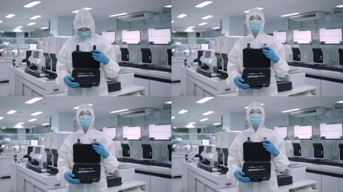 病毒耐药药物被发现。科学家在实验室的无菌室内穿防护服。