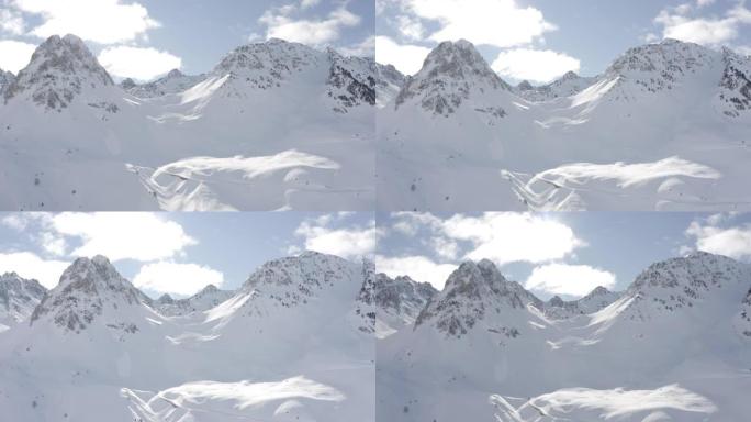 空中无人机拍摄了白雪皑皑的山腰
