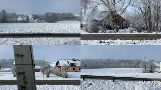 火车驶过带有霜冻的乡村冬季景观