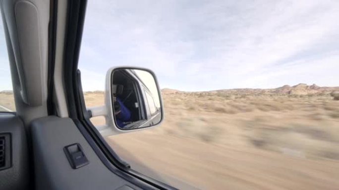 驾驶货车穿越沙漠景观时的视点