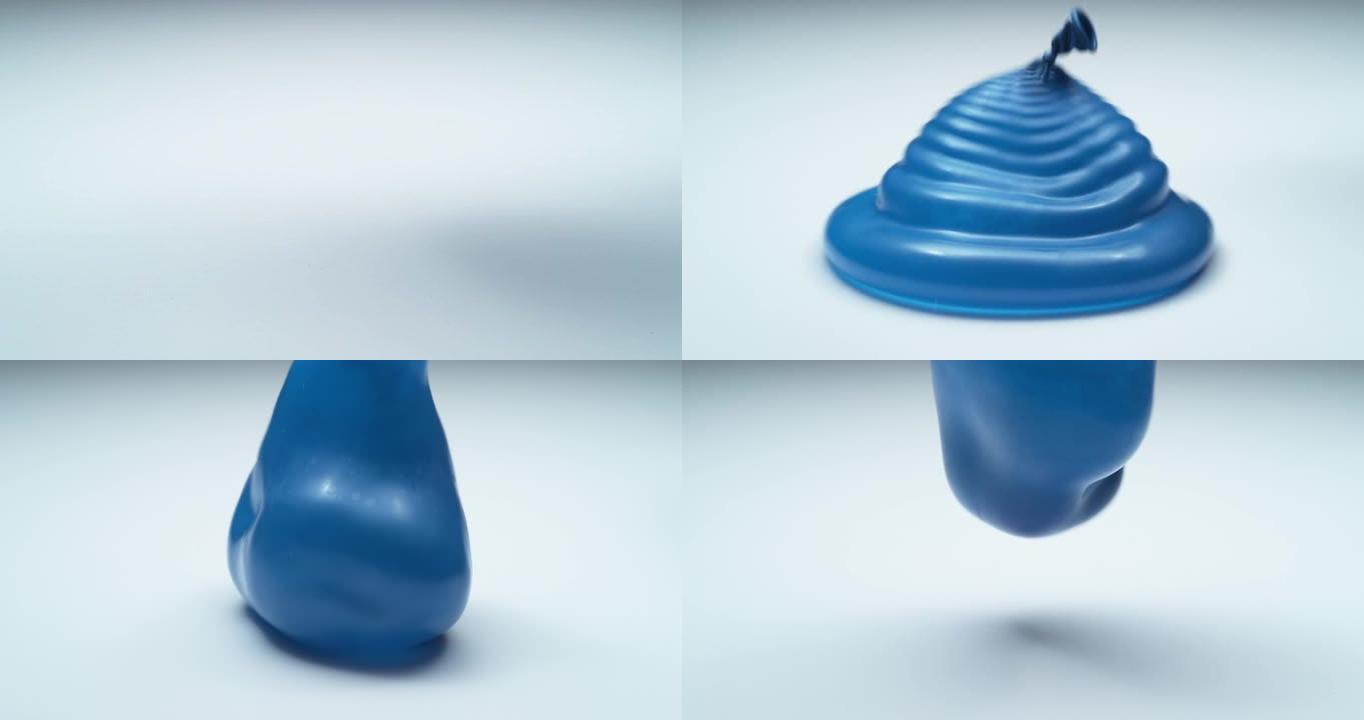 蓝水气球以超慢动作弹跳。在幻影弹性4K上拍摄。