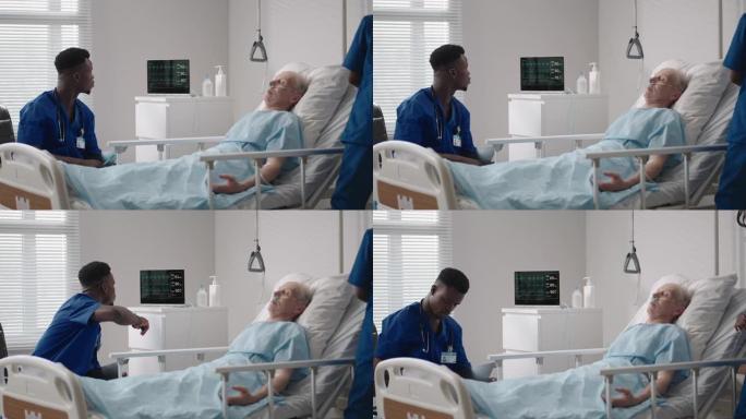 非洲年轻医生团队在医院卧床咨询新型冠状病毒肺炎感染患者。病人躺在医院的病床上，戴着磨砂膏和防护口罩与