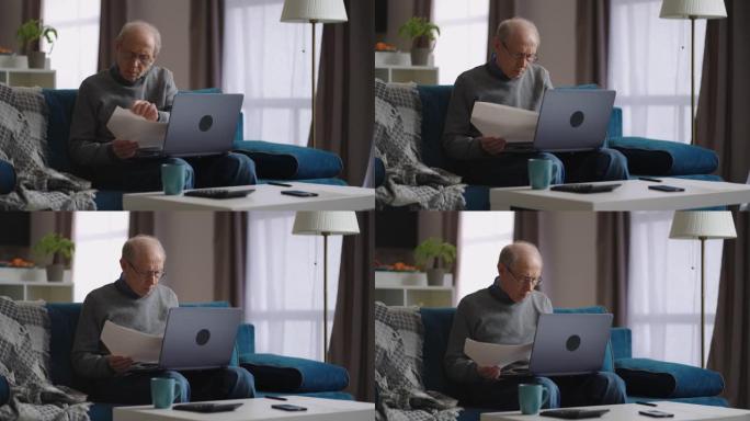 老人正在检查水电费并在家中使用笔记本电脑，退休人员正在计算他的费用