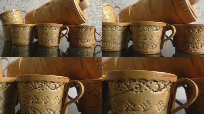 杯子、糖碗和桦树皮水壶。厨具。俄罗斯的民间工艺。复古。
