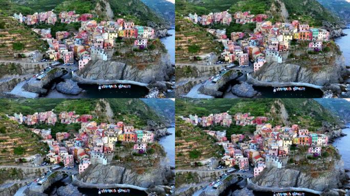 意大利利古里亚著名地标五渔村马纳罗拉市的空中无人机日出场景。欧洲的旅游目的地。联合国教科文组织世界遗