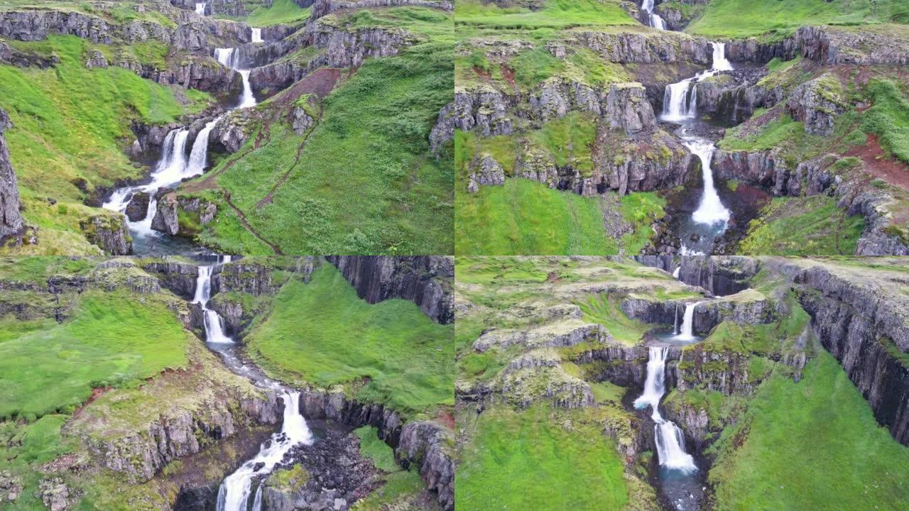 壮观的Klifbrekkufossar瀑布从冰岛东部mj ã ³ ifj ã r ã ur峡湾郁郁葱