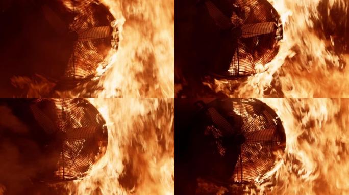 客厅熊熊大火。满火焰的墙壁和地板。燃烧的家具和塑料风扇