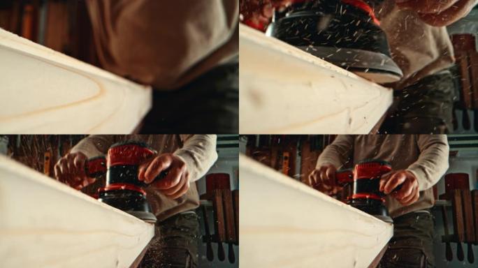 SLO MO DS男性木匠使用圆盘砂光机抚平木板