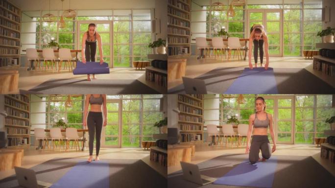 女运动员为锻炼准备瑜伽垫。家庭锻炼