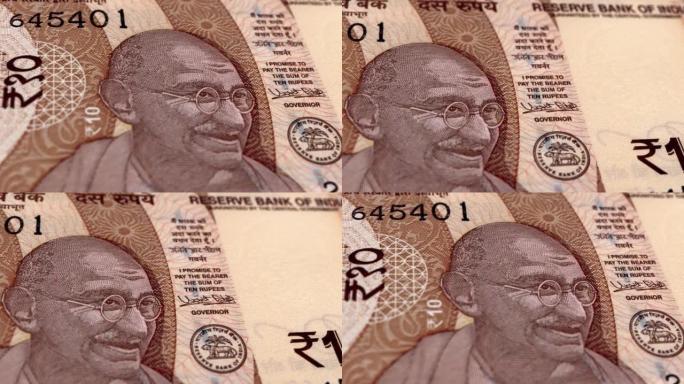 印度印度卢比10钞票，十印度卢比，印度卢比的特写和宏观视图，跟踪和多莉拍摄10印度卢比钞票观察和储备