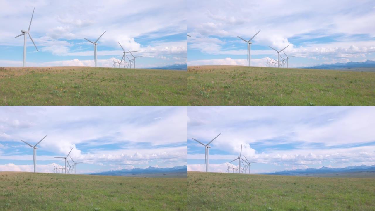 风力涡轮机和草原景观，远山