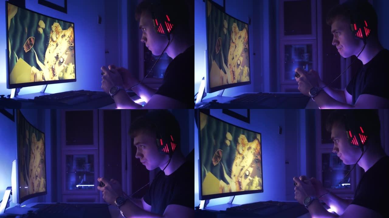 十几岁的男孩玩电脑多人游戏